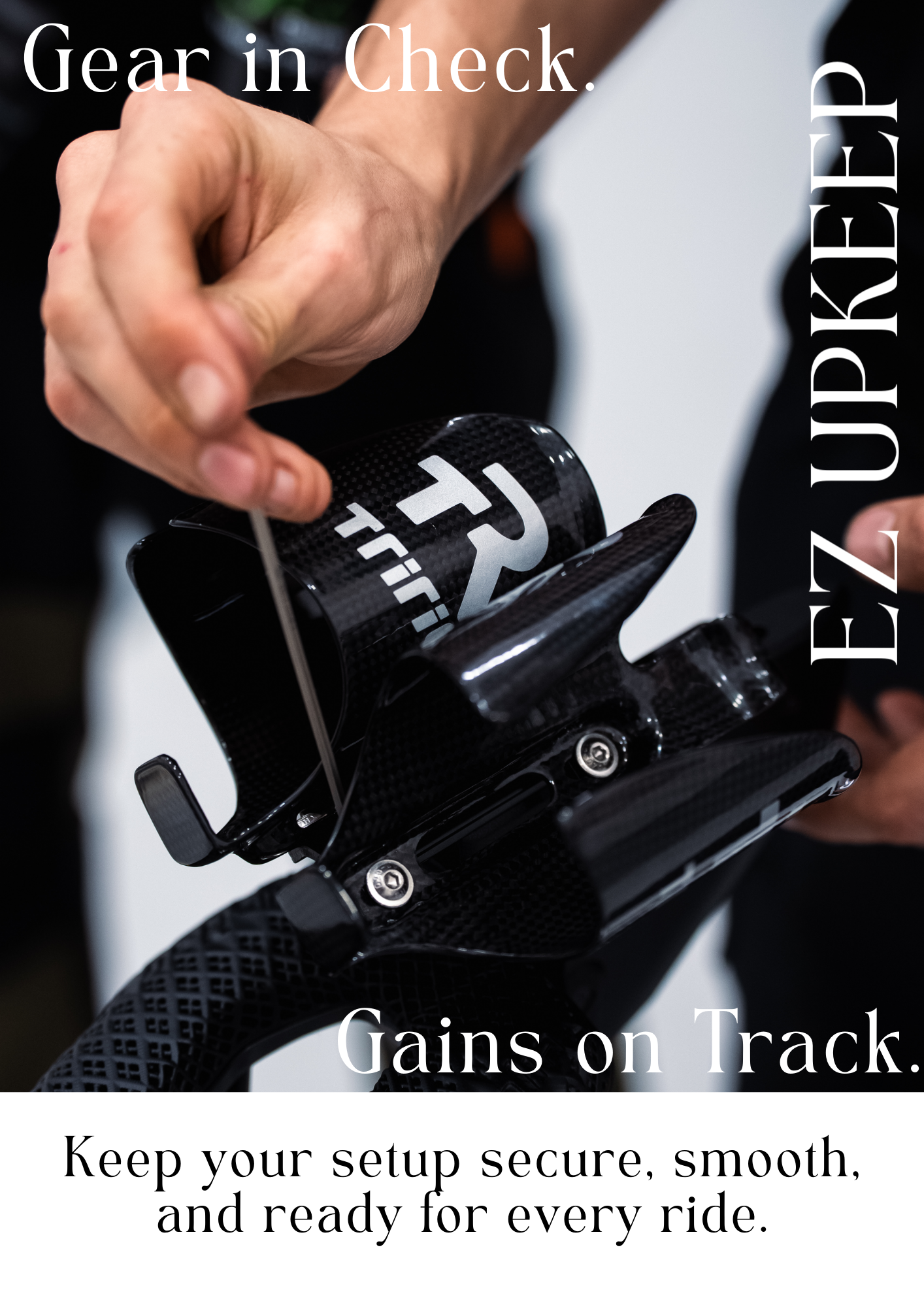 A person using a tool to secure a carbon fiber triathlon rear bottle holder on a bike frame.