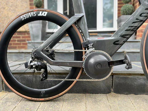 Save 2-5 Watts
Full Carbon
Weight 42 Grams (with tape)
Aerodynamic Performance Tested at the Silverstone Wind Tunnel
Hand Made and Moulded in the UK
Click on the link at the top of the page for fitting instructions.
"Crank arm holes cut to width"
Includes everything needed to fit including 3M tape x 2 carbon tape also included to go on crank arm opening if you choose.
Aero Chainring Guard, Canyon