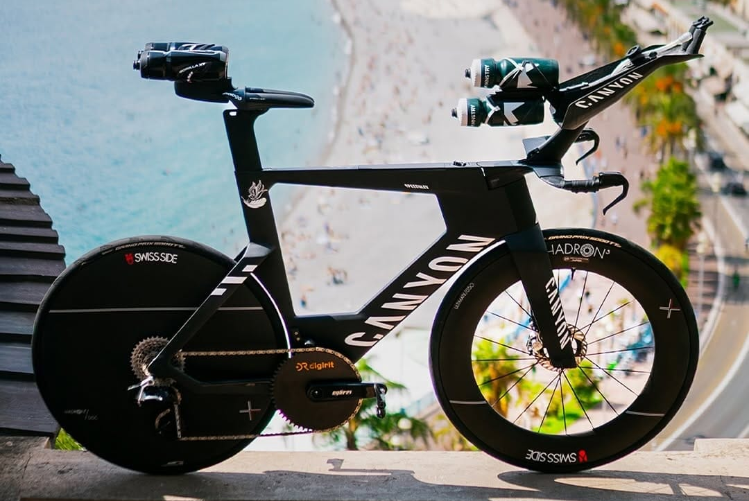 Black Canyon triathlon bike with disc rear wheel and aerodynamic aero bars.