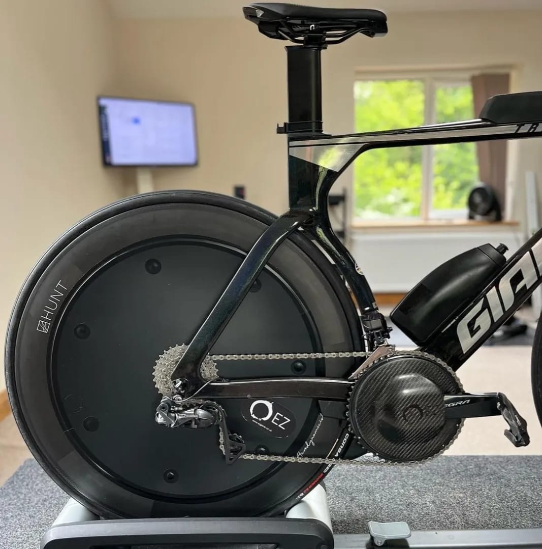 Triathlon bike with Hunt disc wheel and EZ Gains aerodynamic chainring guard.