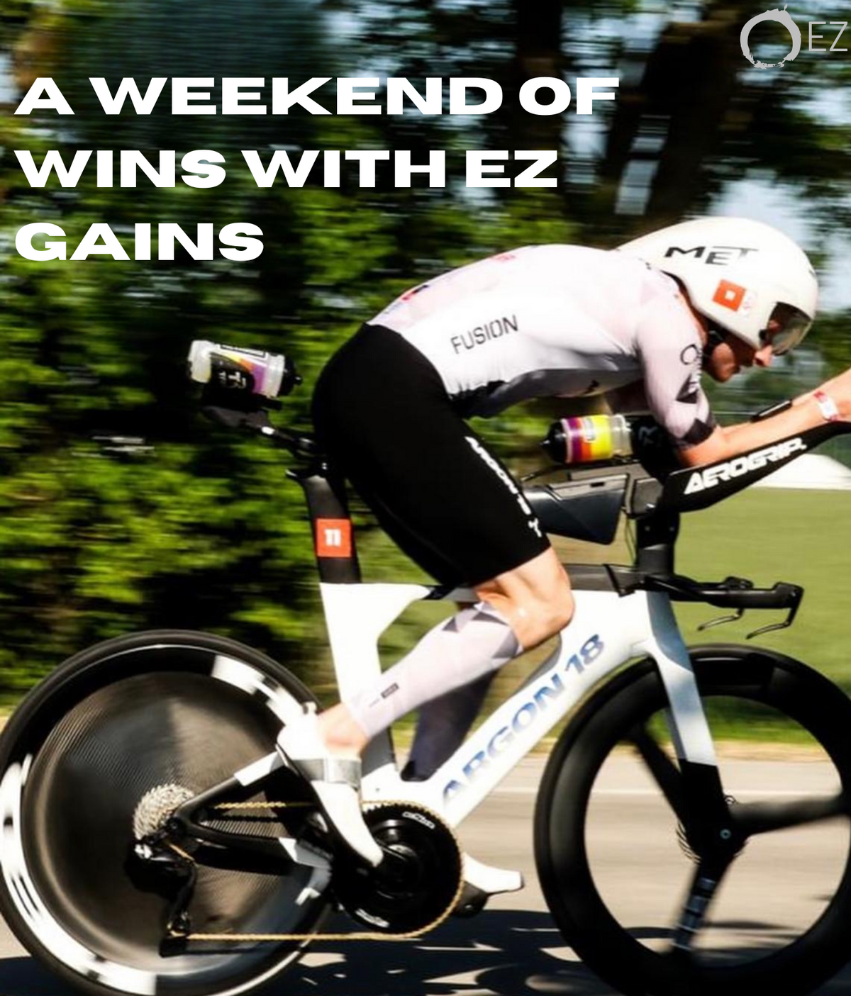 Triathlete riding an Argon 18 bike with disc wheel covers and aerodynamic gear.