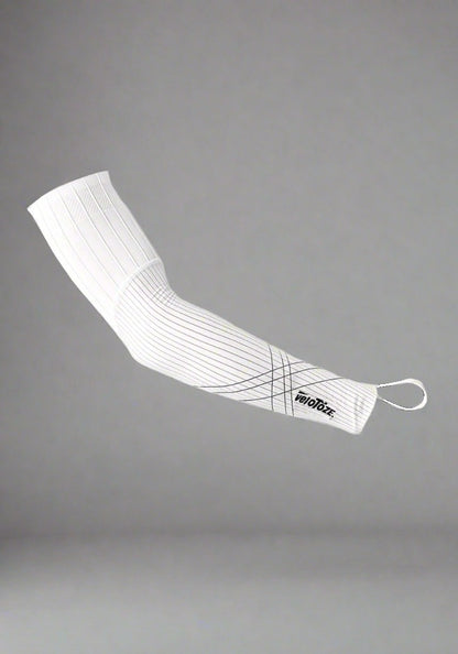 White cycling arm sleeve with black geometric lines, elastic cuff, and veloToze logo