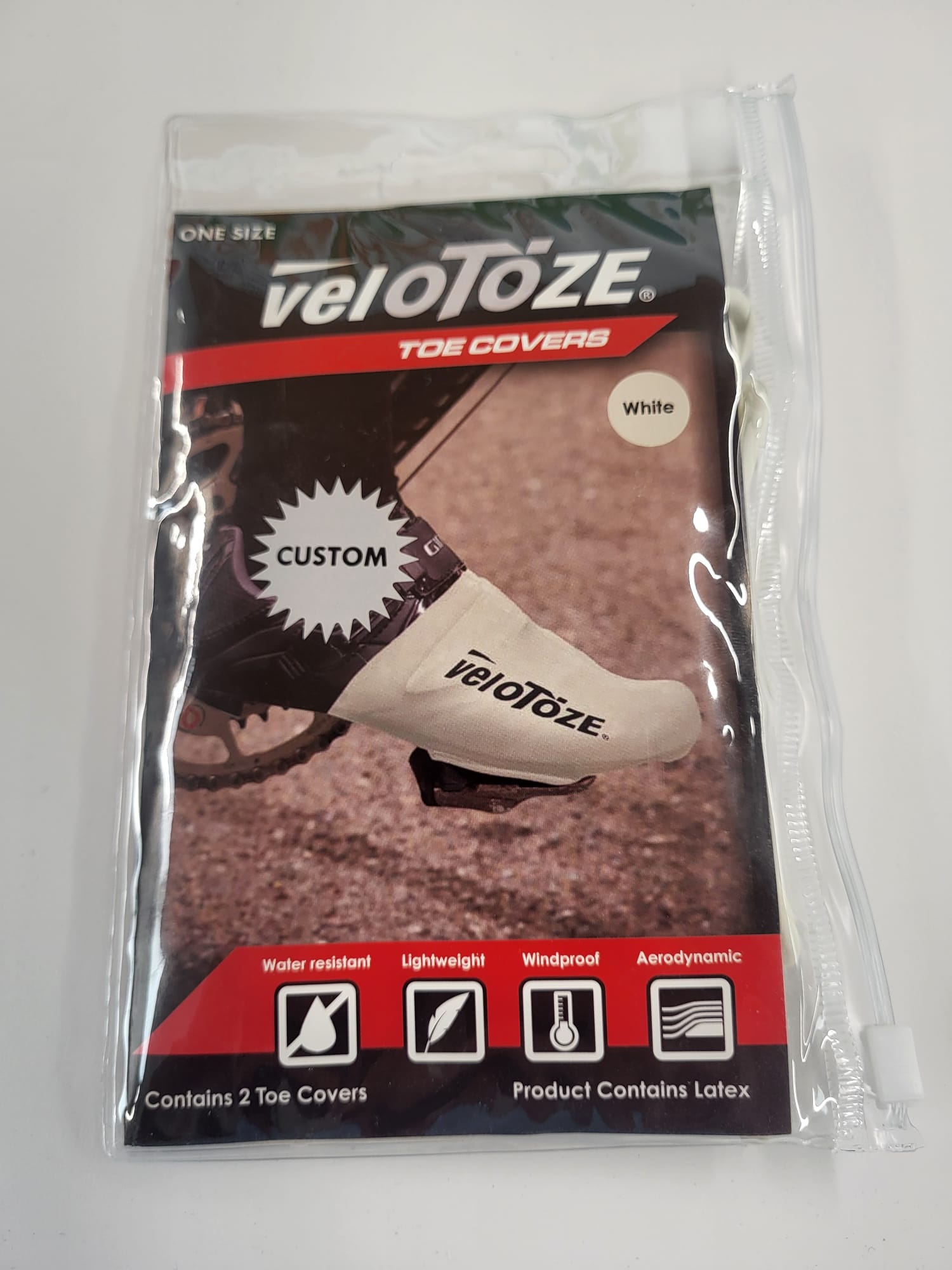 Aero Toe cover to fit over your cycle shoe keep your feet warm and smooth over the straps and fastening mechanisms creating an aero effective shape. #toecover #black #white #aero #cyclingshoe